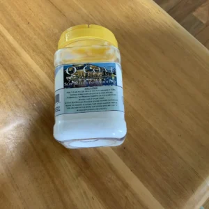 A Coat Slip reducing additive